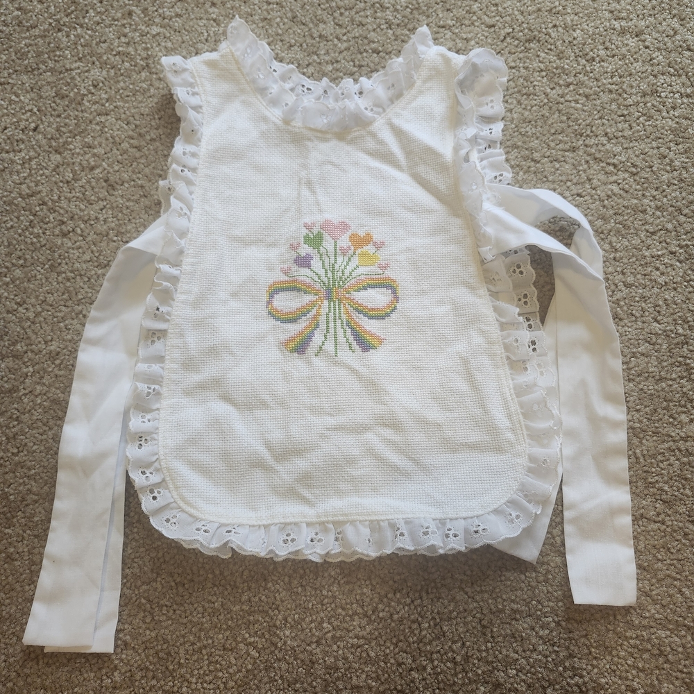 White Cross-Stitch Lace Bib with Pastel Floral Bow